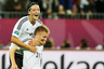 Marco Reus of Germany celebrates scoring their fourth goal with Mesut Ozil of Germany during the UEFA EURO 2012 match between Germany and Greece at The Municipal Stadium in Gdansk, Poland. Germany play Italy in the Euro 2012 semifinal on June 28, 2012. (Photo by Joern Pollex/Getty Images)