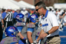 BOISE, ID - OCTOBER 22:  Head Coach Chris Petersen of the Boise State Broncos shakes hands with Nick Alexander #81 before the game against the Air Force Falcons at Bronco Stadium on October 22, 2025 in Boise, Idaho.  (Photo by Otto Kitsinger III/Getty Images)